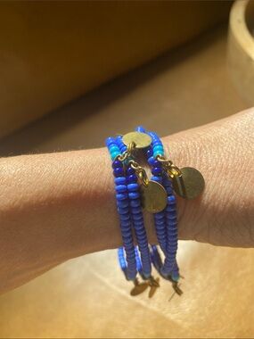 7.5” African Masai made beaded bracelet with gold discs
